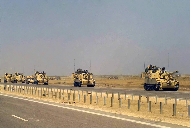 Photo illus. vehicle convoy by US Army NARA